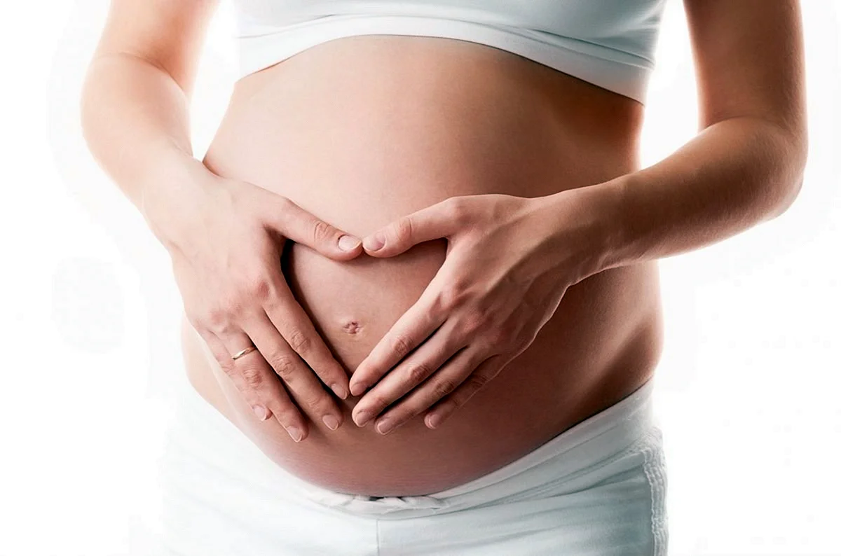 Беременная женщина живот
