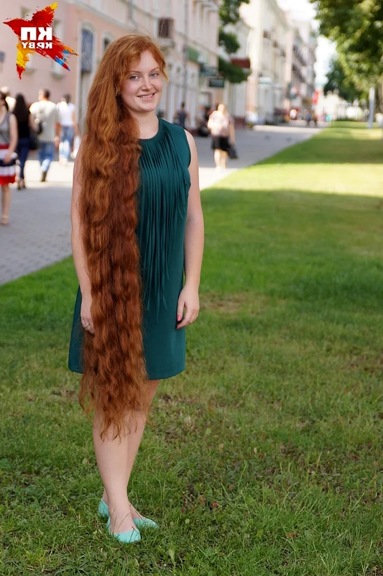 Длинные рыжие волосы в косе