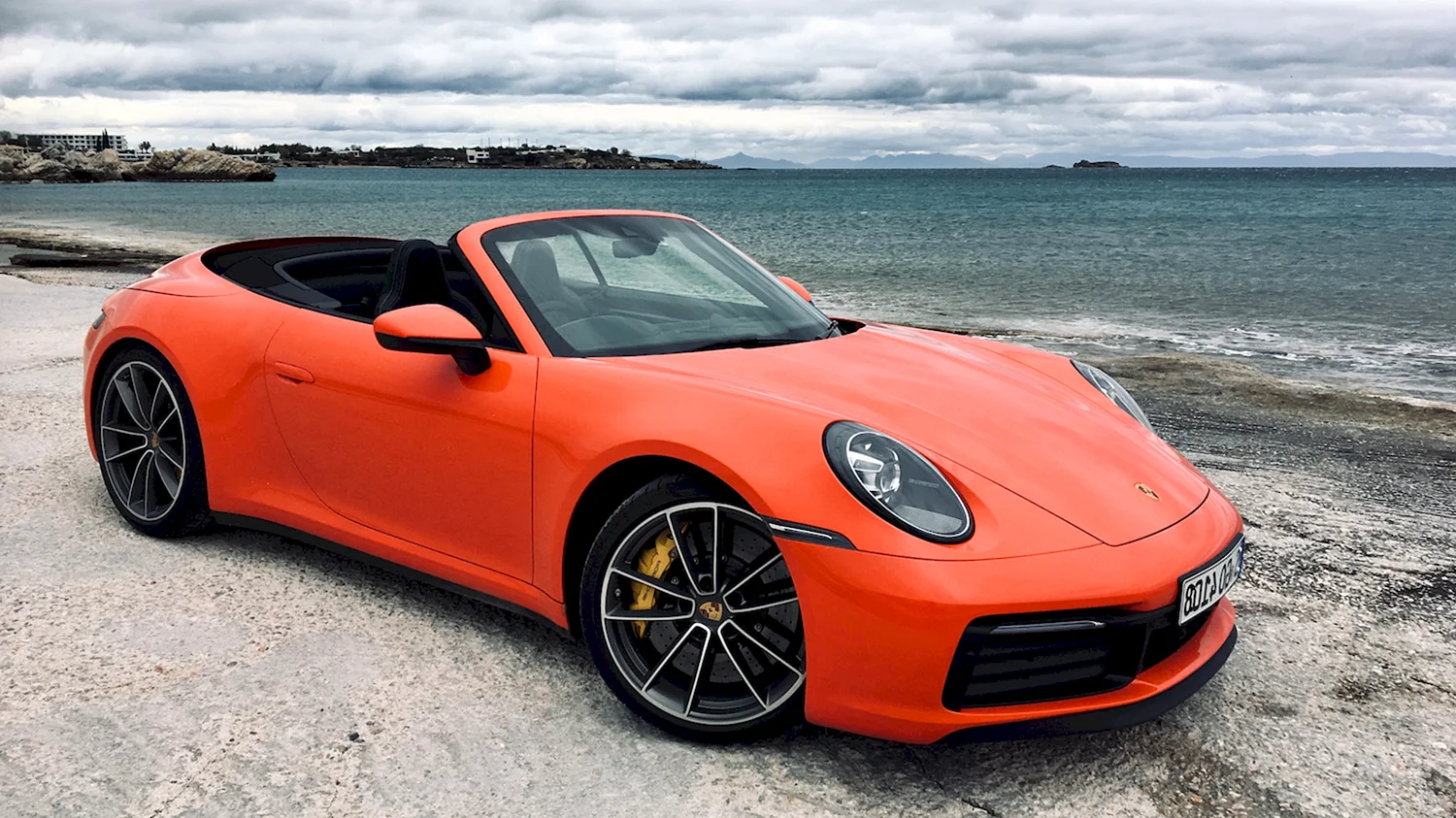 Кабриолет оранжевый Porsche 911
