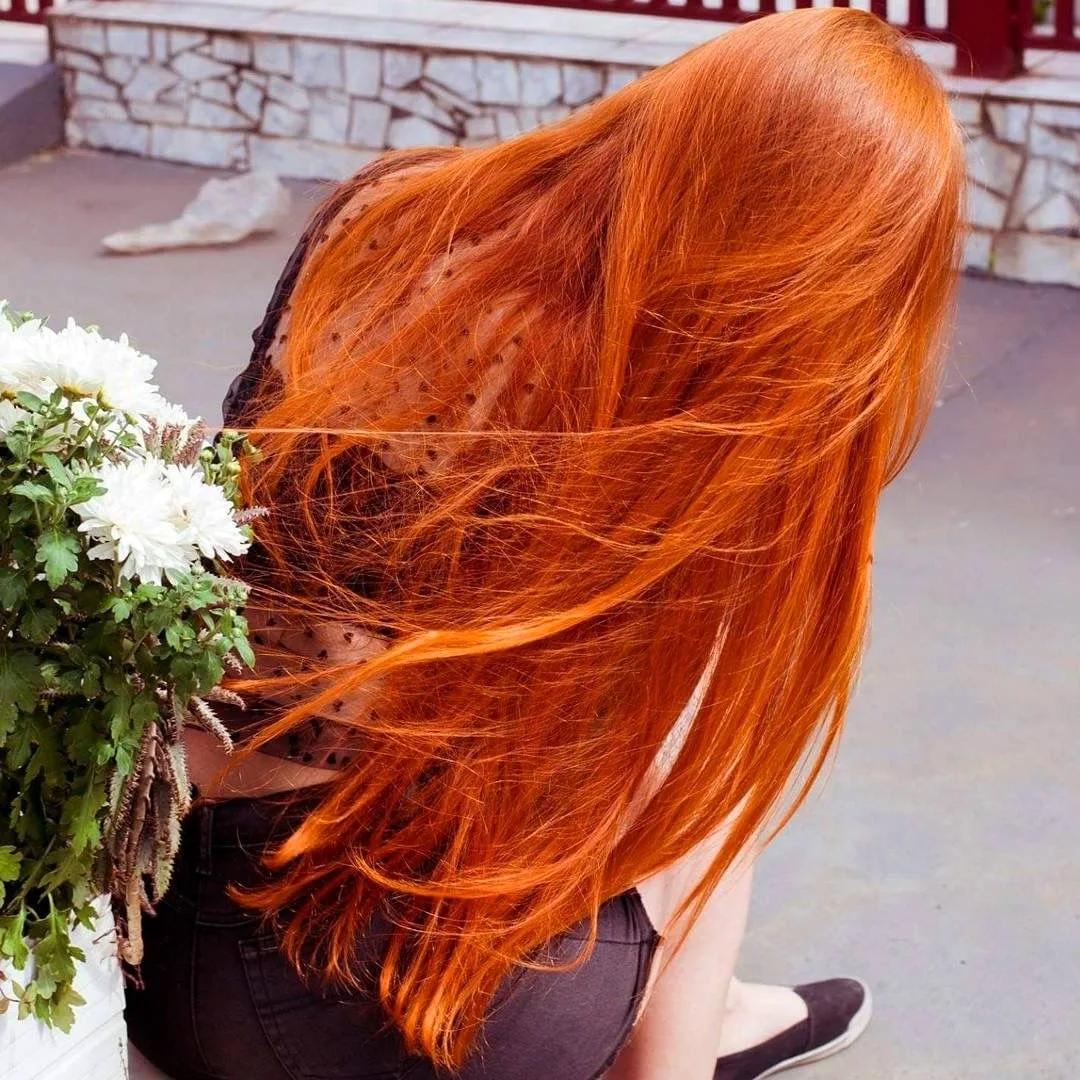 Красивые длинные рыжие волосы
