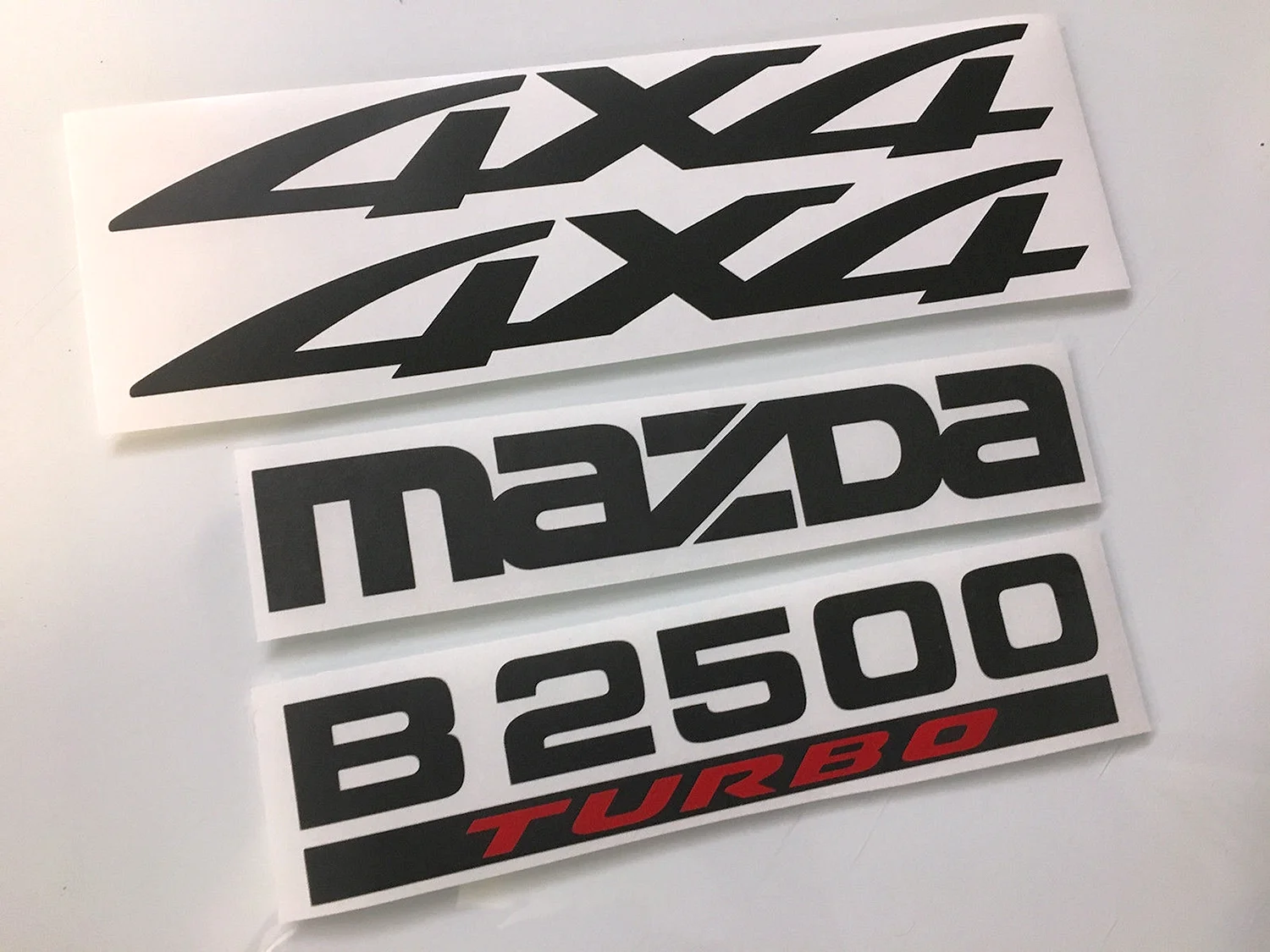Наклейка 4wd Turbo Mazda Bongo