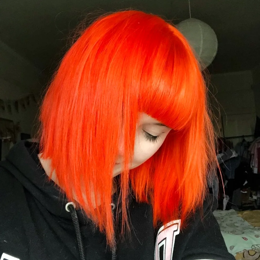 Неоново оранжевые волосы