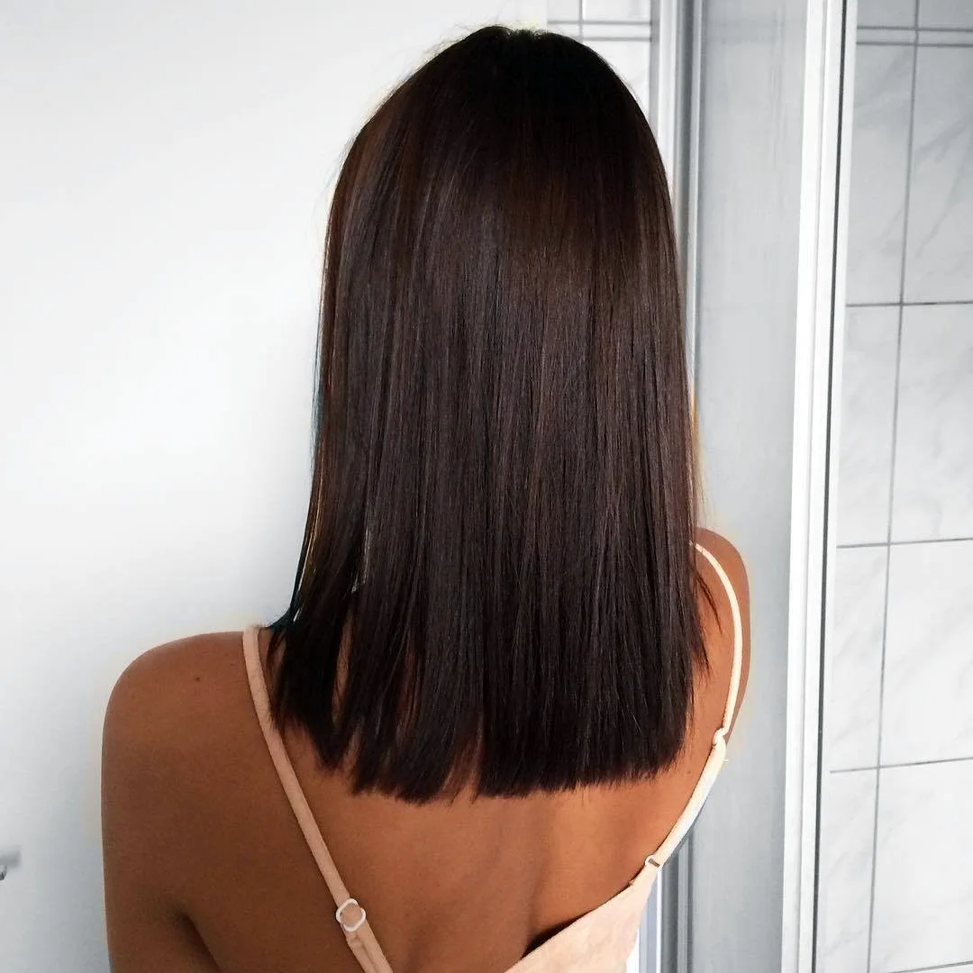 Стрижка на длинные волосы сзади фото треугольником