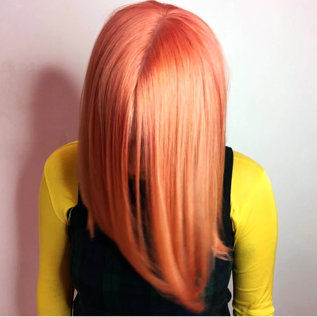 Розово-оранжевый цвет волос