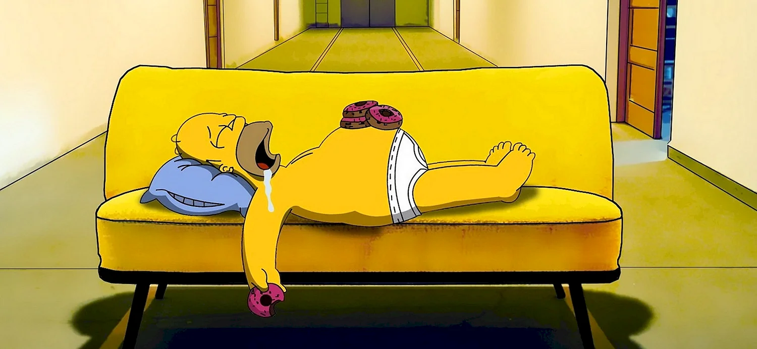 Гомер симпсон лежит на диване