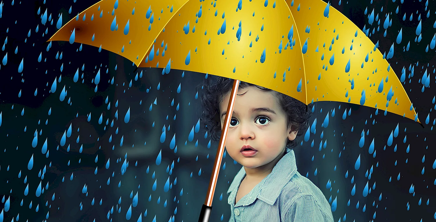 Мальчик под зонтиком